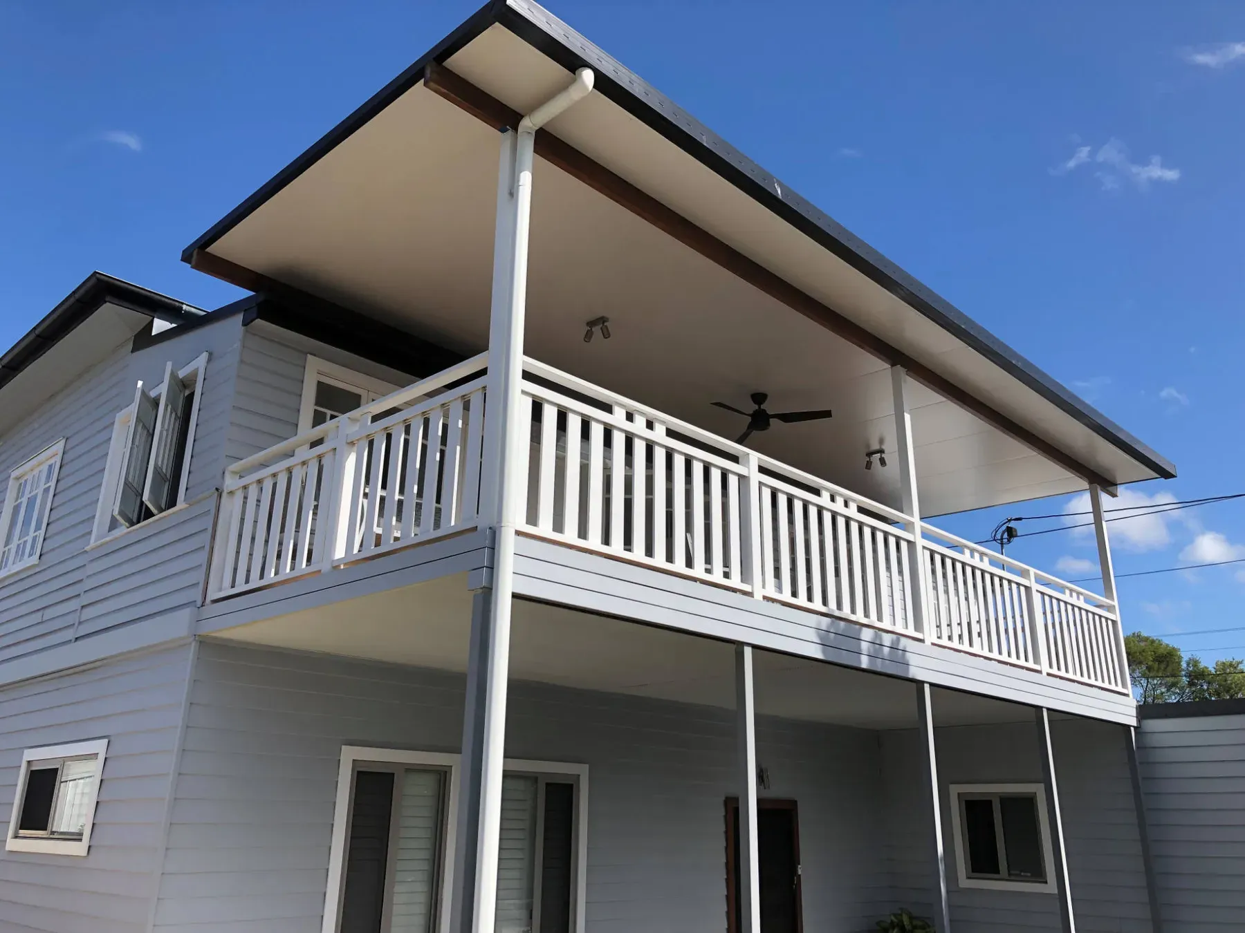 Two-storey verandah deck under a skillion roof