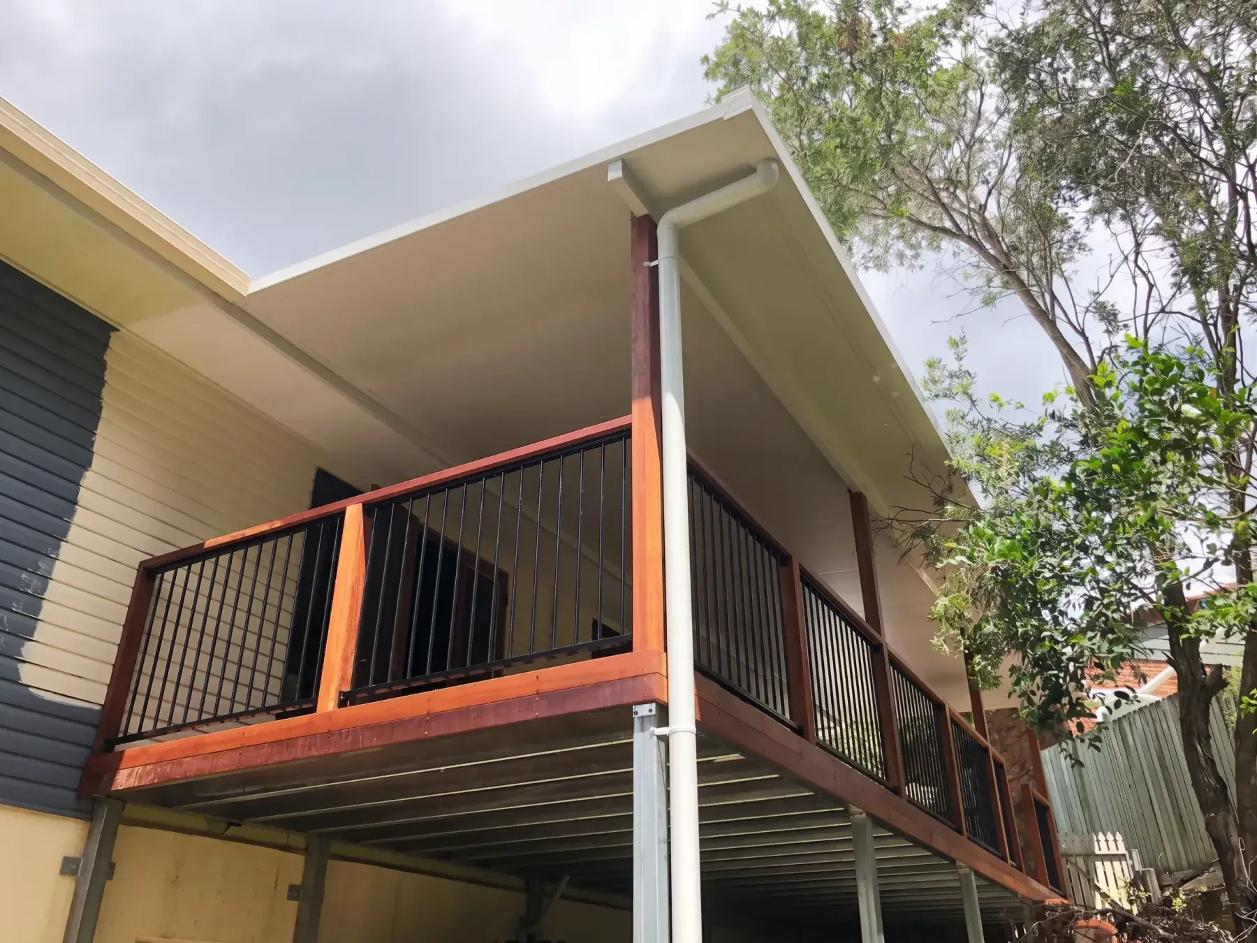Elevated balcony deck with dark balustrade