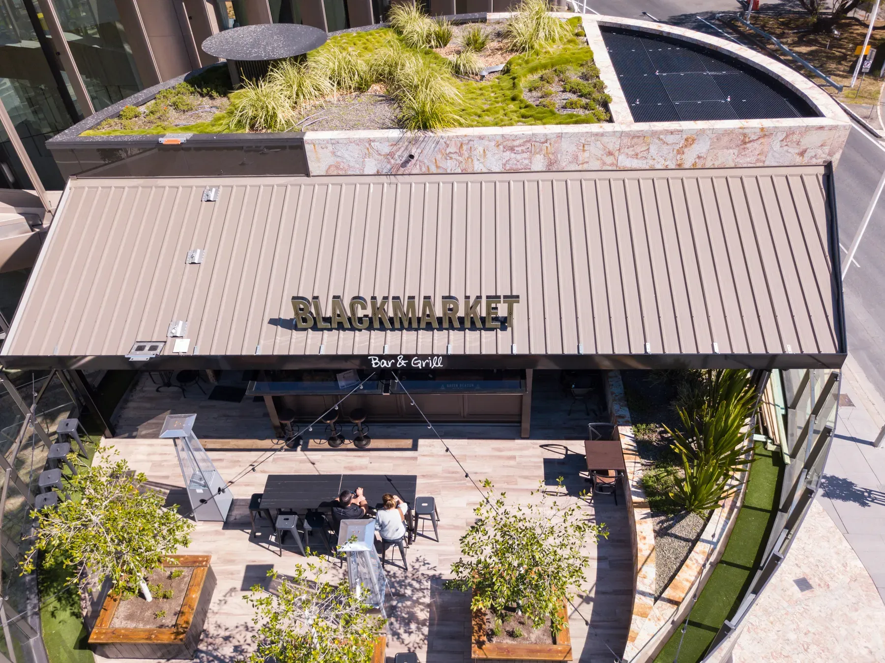Restaurant awning and courtyard seen from above