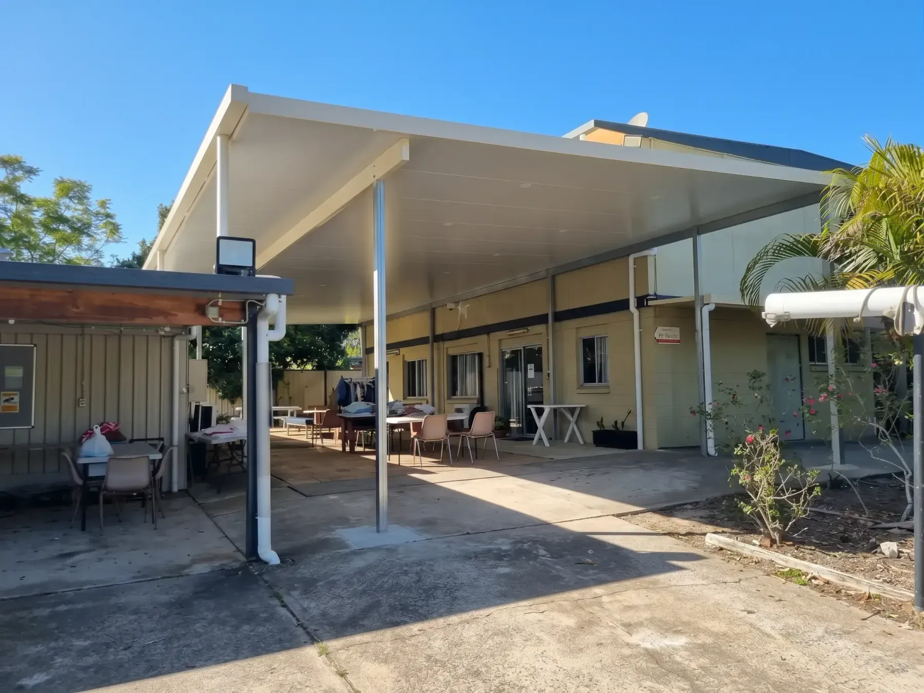 Long awning over the front of a single-storey building