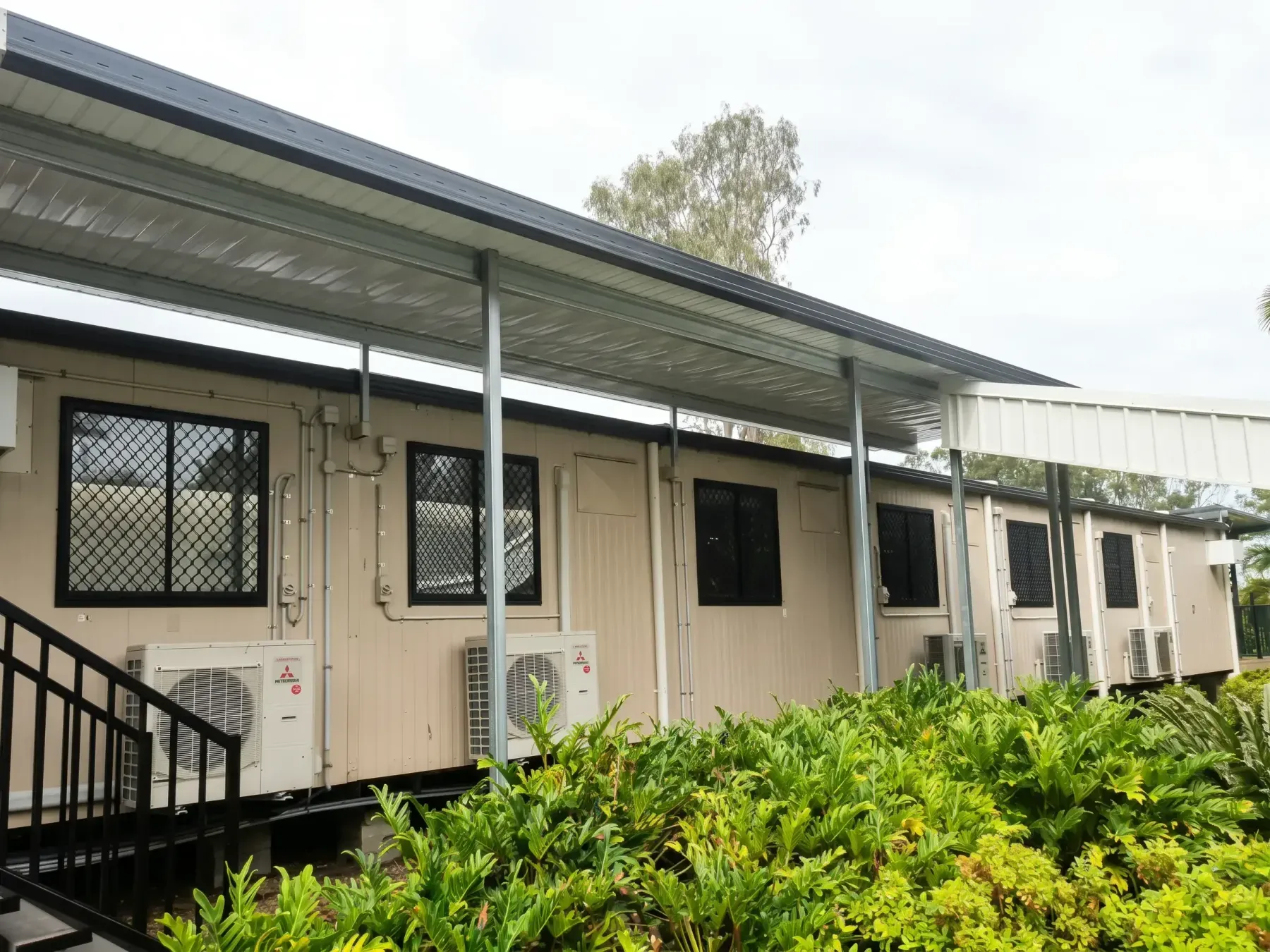 Covered walkway along modular buildings