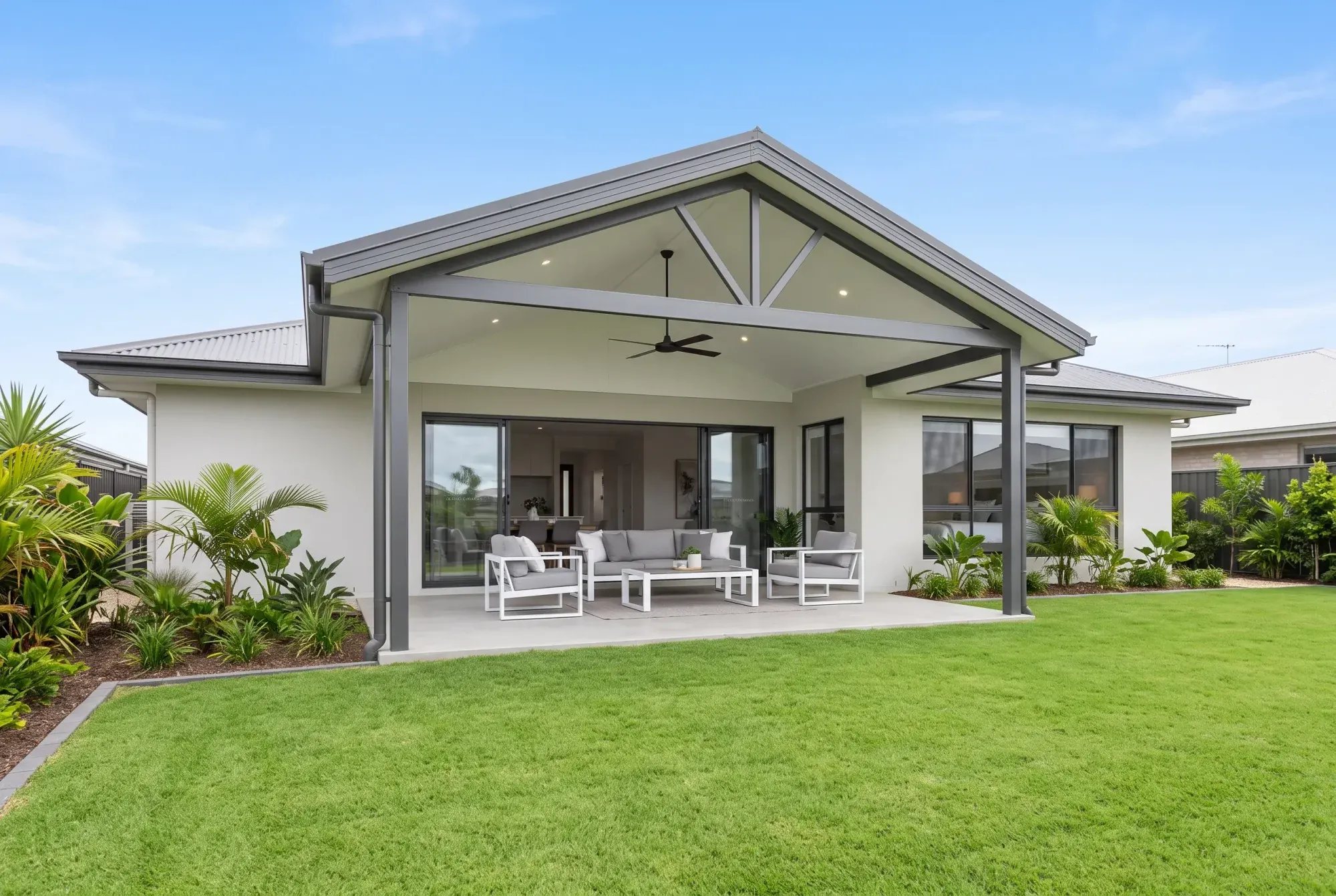 Gable patio over an entertaining area at the back of a home