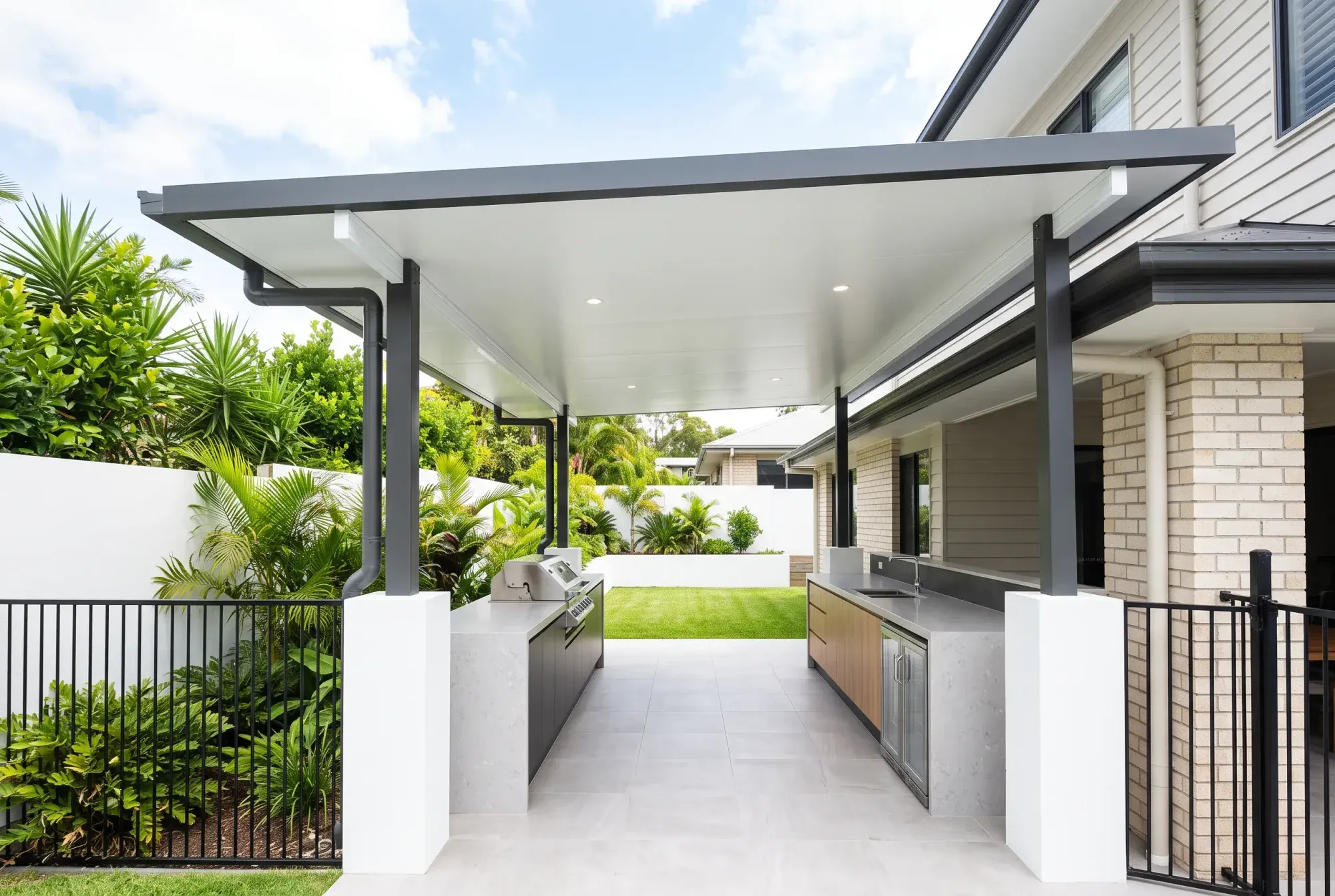 Insulated patio roof over a barbecue area
