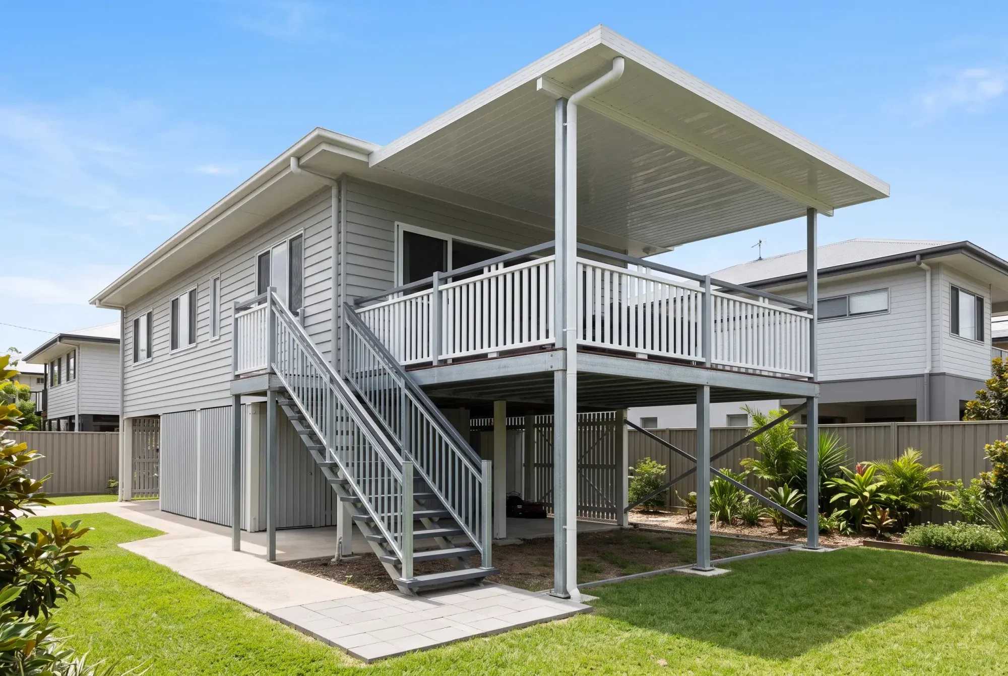 Side view of a high steel deck with a straight steel stair