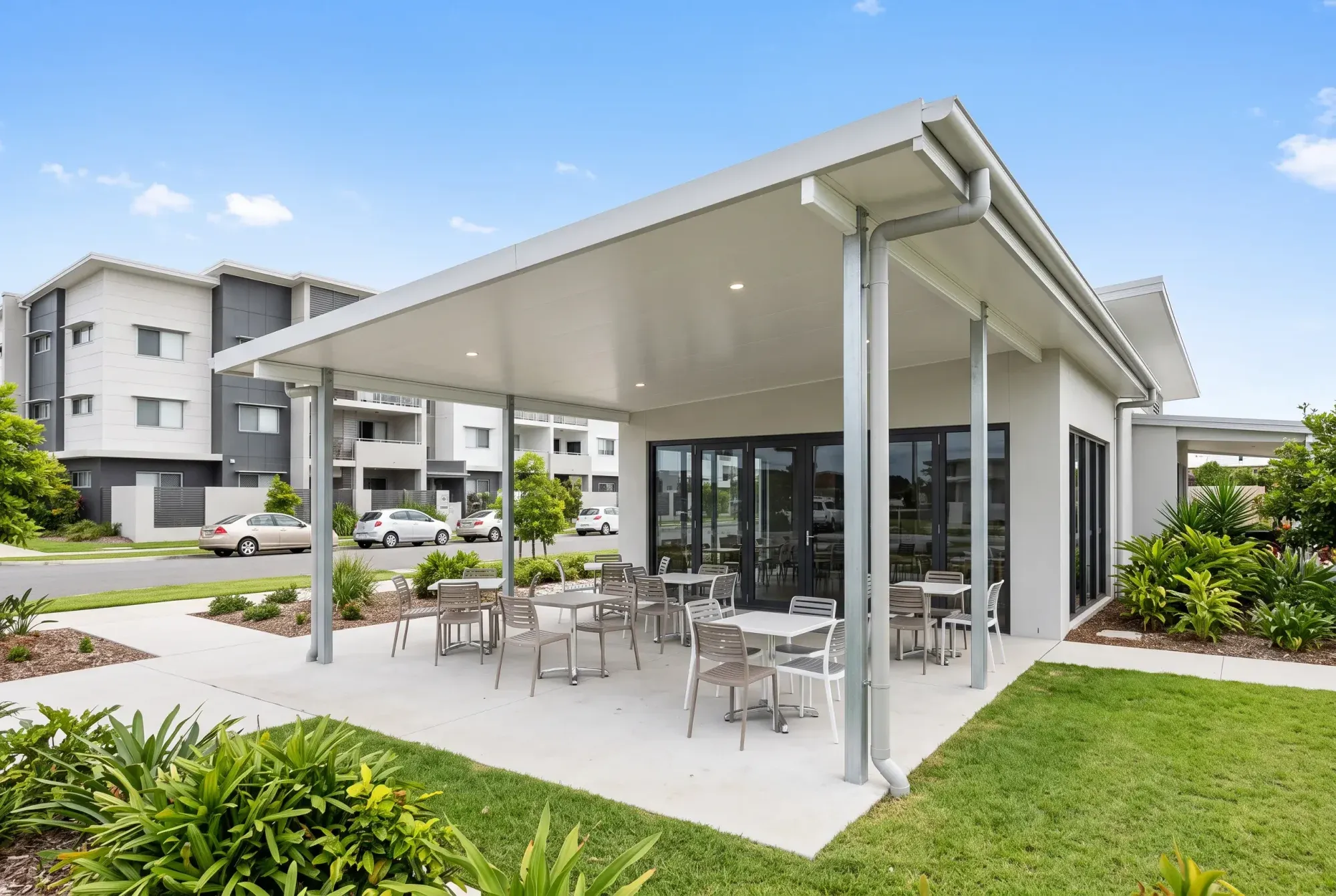 Insulated roof over outdoor seating at a cafe