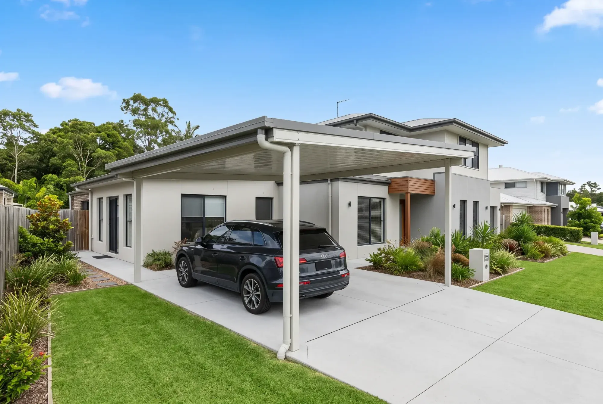 Skillion carport over a car and driveway