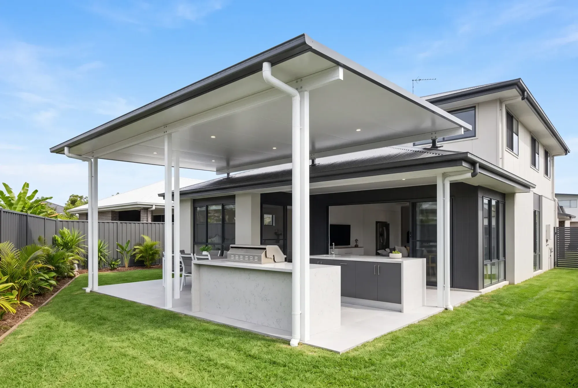 Insulated flyover patio over an outdoor kitchen